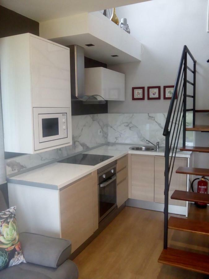 Apartamentos Puerta De Gijon Bagian luar foto